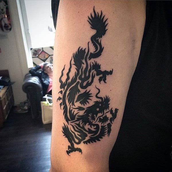 Outer Bicep Tribal Dragon Tattoos For Men