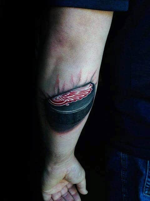 Outer Forearm 3d Hockey Puck In Skin Guys Tattoo