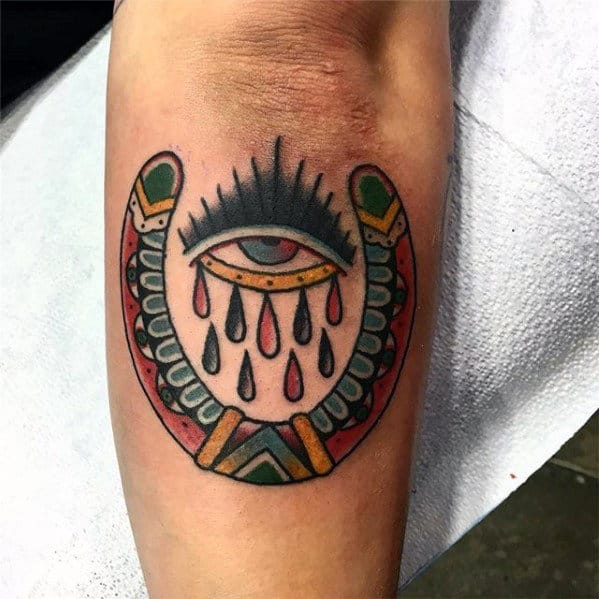 Outer Forearm Eye With Tears And Horseshoe Guys Traditional Tattoo