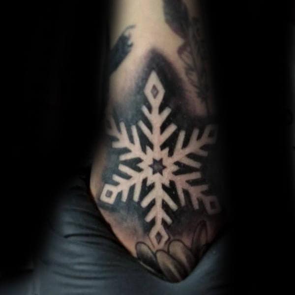 Outer Forearm Negative Space Black Ink Snowflake Tattoos For Males