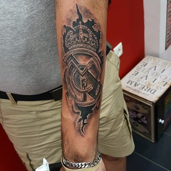 Outer Forearm Torn Skin Male With Cool Real Madrid Tattoo Design