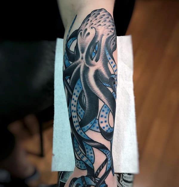 Outer Forearm Traditional Octopus Male Black And Blue Ink Tattoos