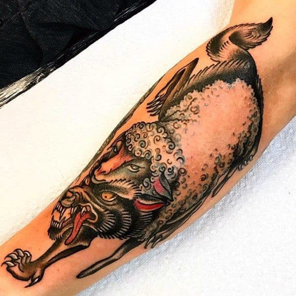 outer-forearm-wolf-in-sheeps-clothing-guys-tattoos