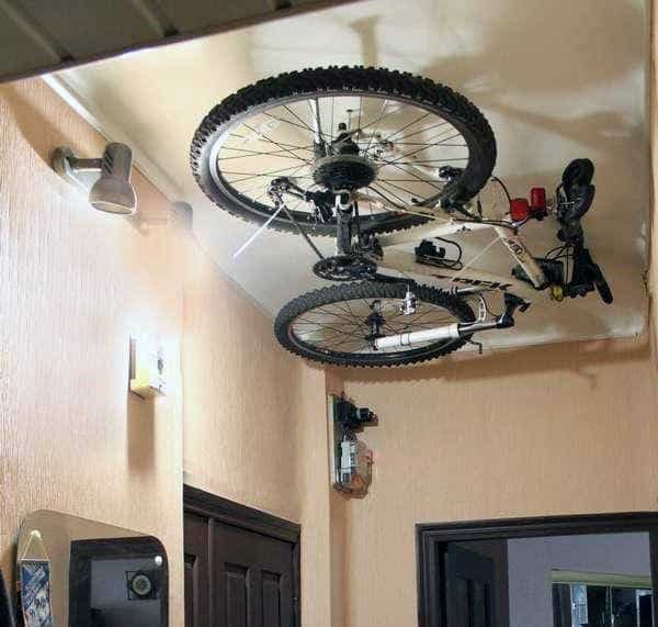store bike on ceiling