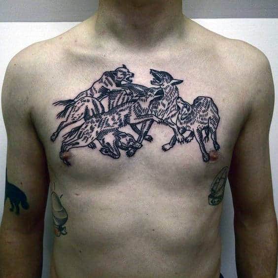 Pack Of Wolves Chest Tattoo On Man