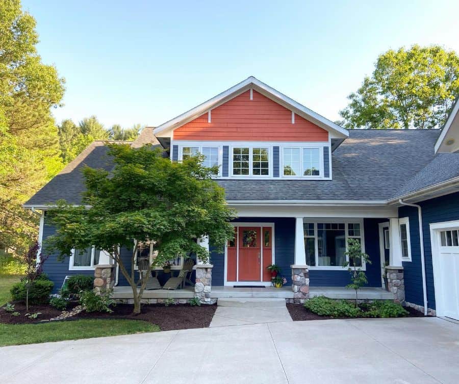 blue and red craftsman style home 