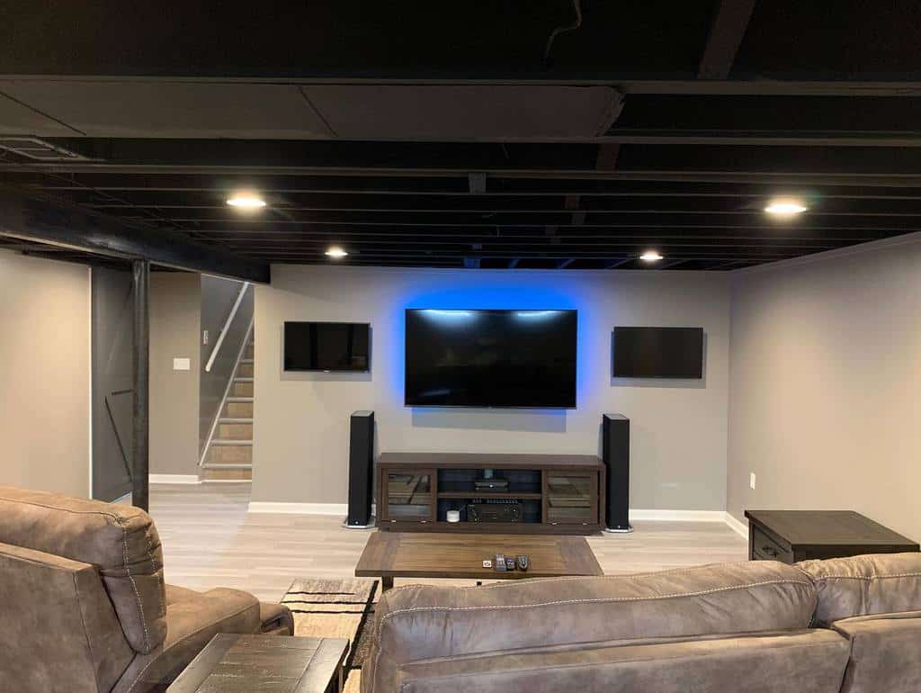 basement lounge room with tv