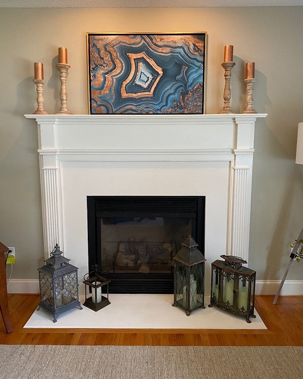 white fireplace candlesticks abstract art lanterns 