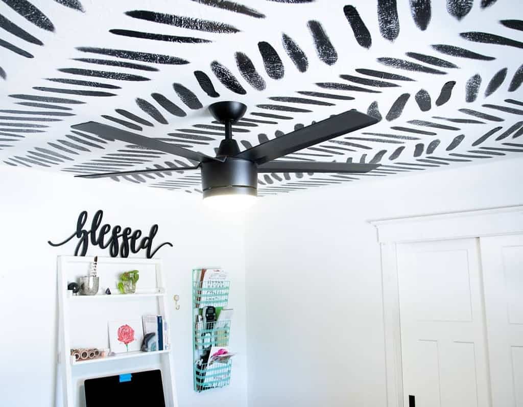 black and white design ceiling with fan