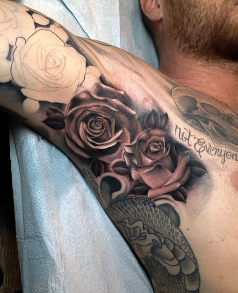 Pair Of Gorgeous Roses Tattoo On Guys Armpit