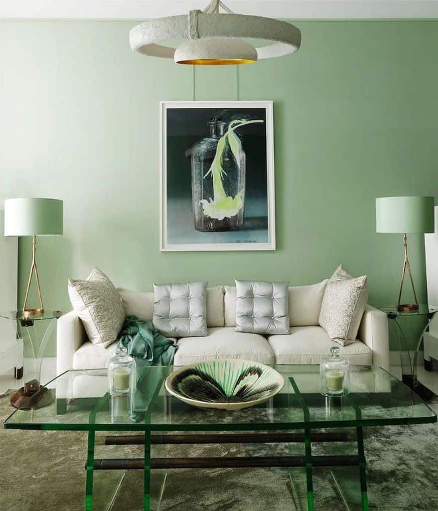 pastel green living room with white sofa 