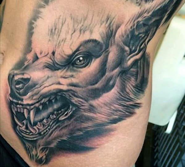 Pencil Shaded Werewolf Head Tattoo On Mens Torso