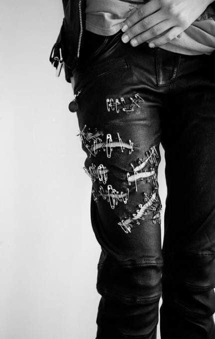 Leather pants with safety pins