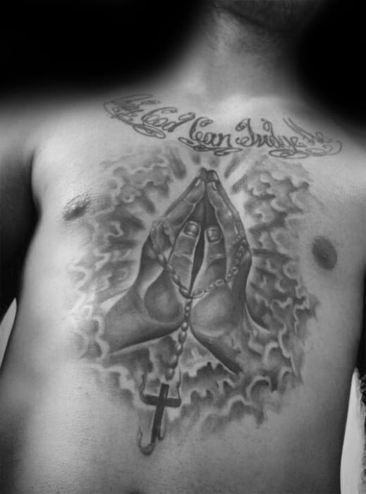 praying hands with clouds and only god can judge me male chest tattoo
