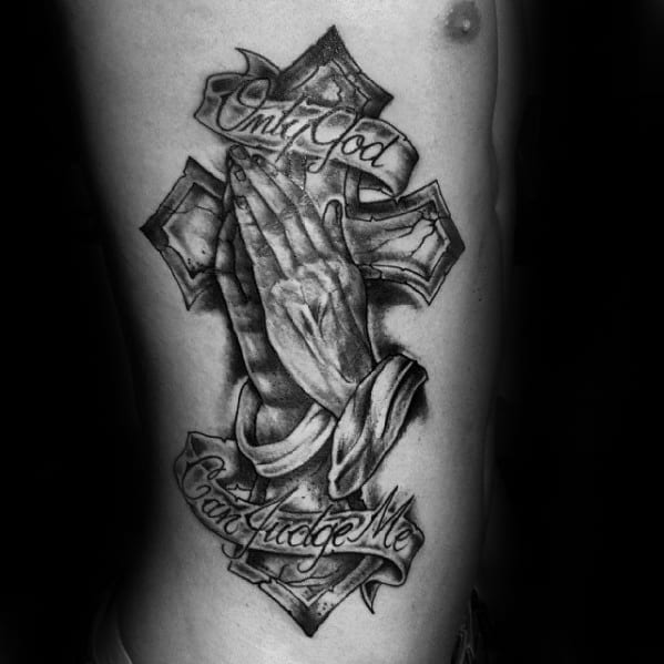 praying hands with cross and only god can judge me male rib cage side tattoos