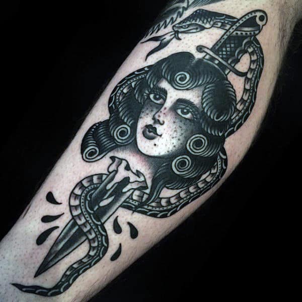pretty-woman-with-broken-knife-and-snake-tattoo-on-mens-forearm