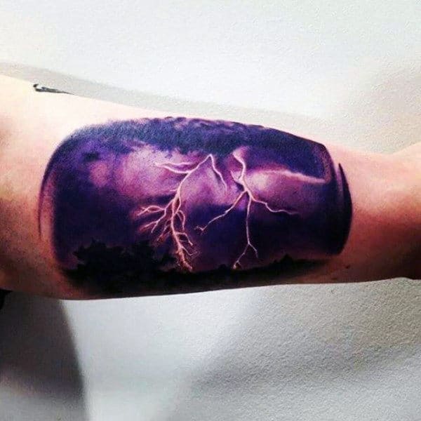 Purple Night Sky With Dark Clouds And Storm Lighting Mens Bicep Tattoo