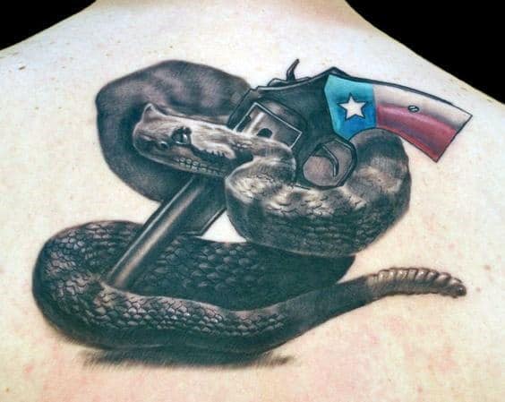 Rattlesnake Revovler Mens Upper Back Tattoo With Realsitic Design