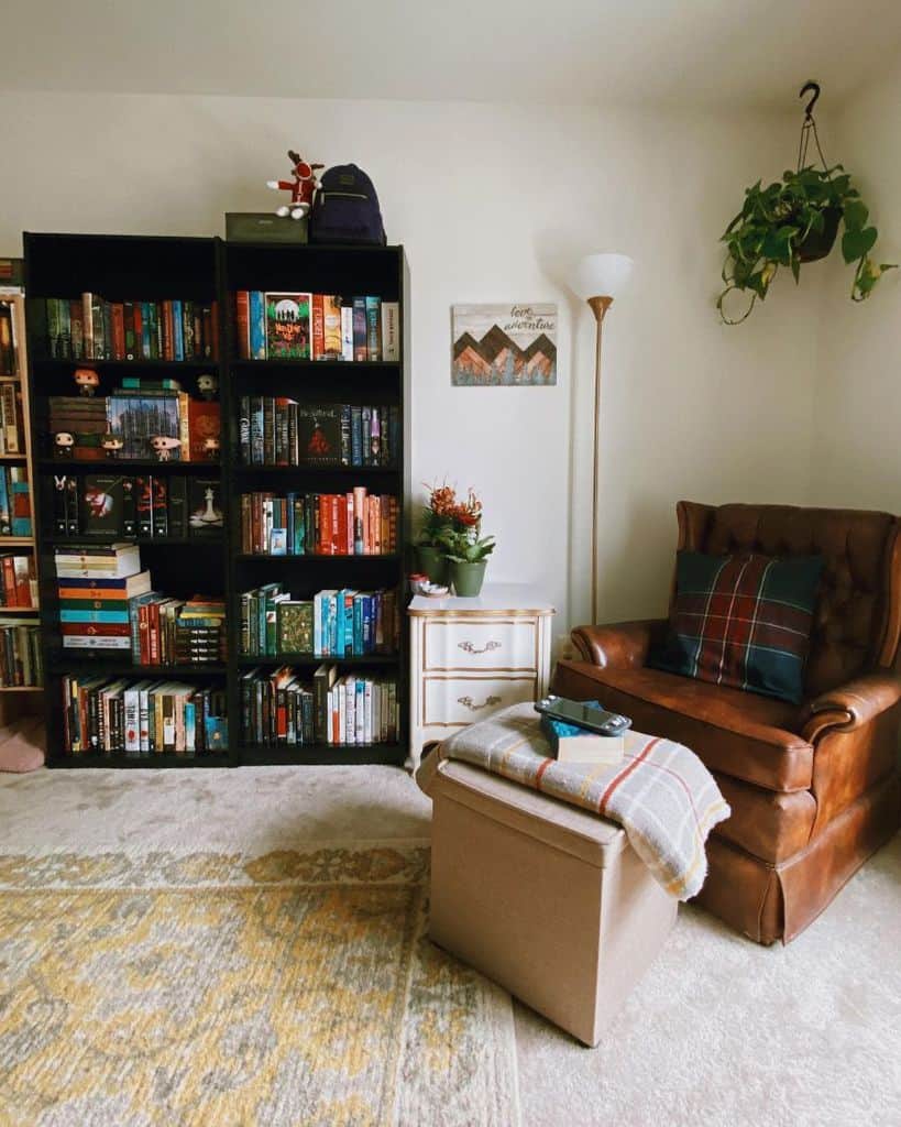 corner reading nook with leather armchair and bookcase 