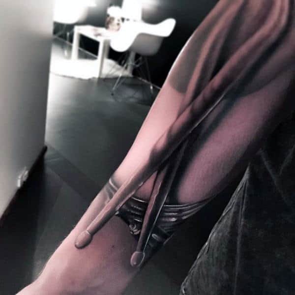 Realistic 3D Music Drum Sticks Tattoos For Men On Lower Forearm