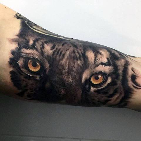Realistic Arm Male Tiger Eyes Tattoo Designs