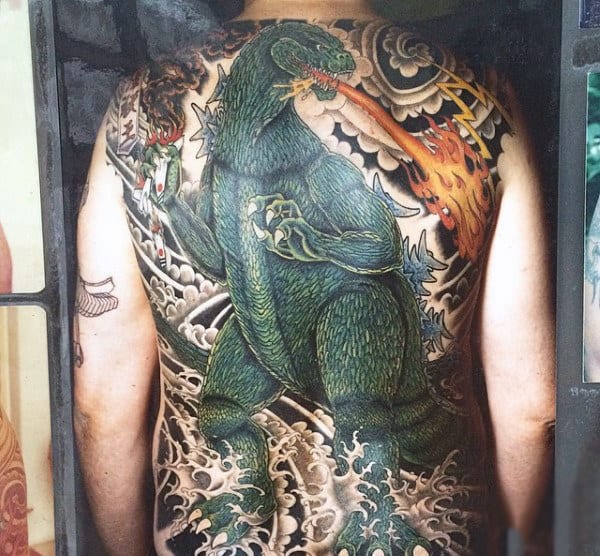 Realistic Backpiece Of Godzilla With Fire Lightning Water Tattoo On Guy