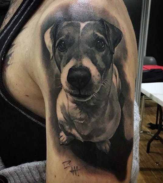 Realistic Guys Shaded Dog Tattoo On Upper Arm With Black Ink
