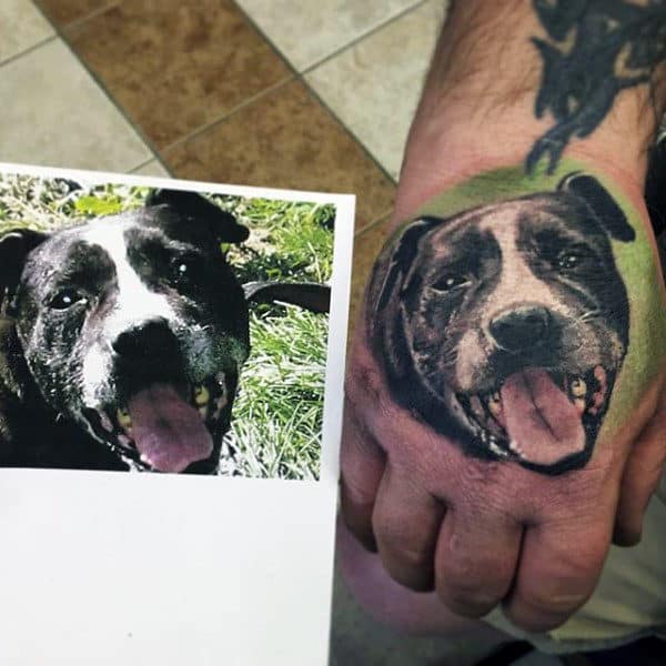 Realistic Mens Hand Tattoo Of Dog