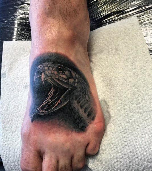 Realistic Spitting Cobra Mens Tattoo On Foot