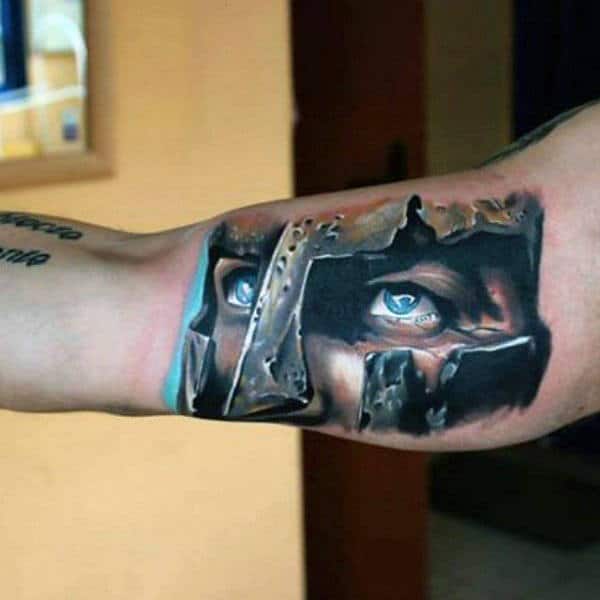 Realistic Warrior Tattoo With Deep Blue Eyes Male Arms