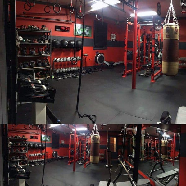 red wall garage gym dumbbells 