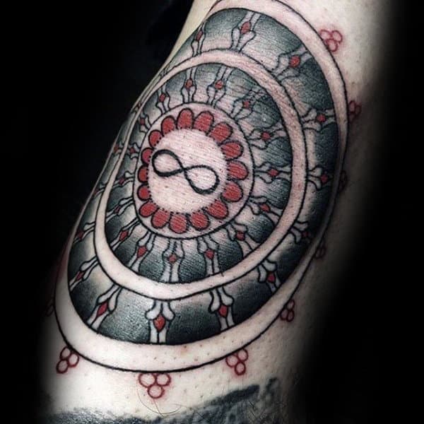 Red And Black Ink Guys Dharma Wheel Tattoos