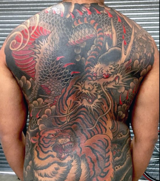 Red And Black Male Tiger And Dragon Full Back Tattoo Inspiration