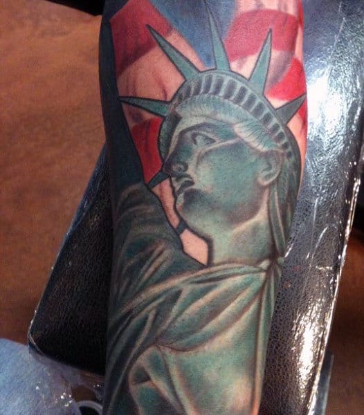 Red Blue And Green Statue Of Liberty Male Tattoo