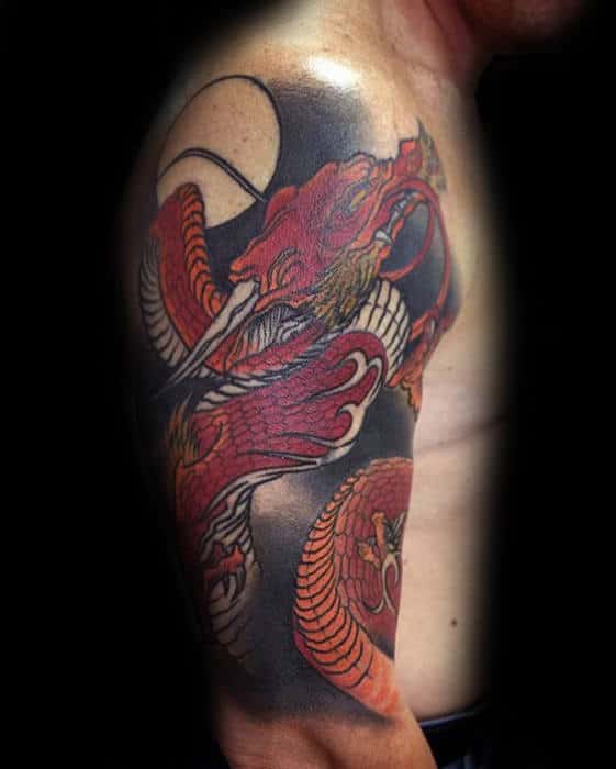 Red Dragon With Negative Space Moon Mens Arm Tattoos