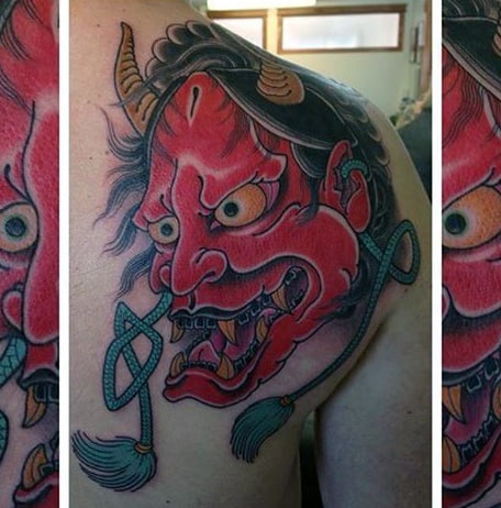 Red Ink Hannya Mask Shoulder Blade Tattoo For Men