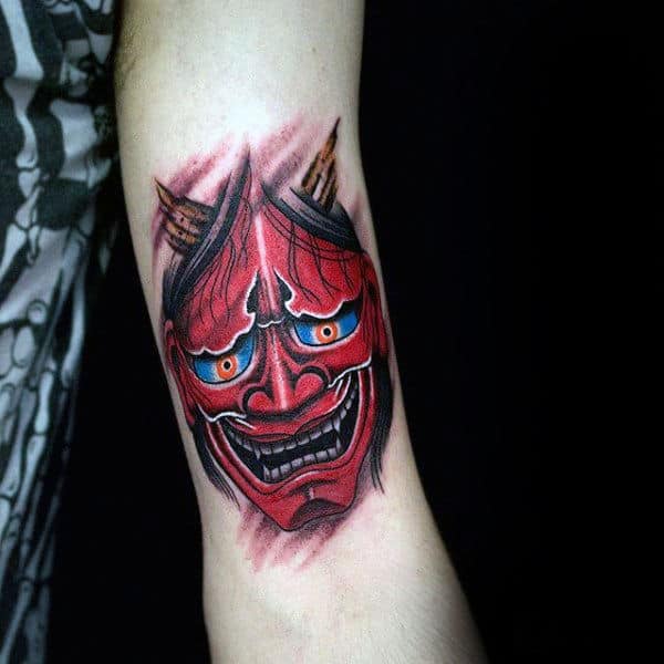 Red Ink Hannya Mask With Glowing Blue Eyes Mens Arm Tattoo