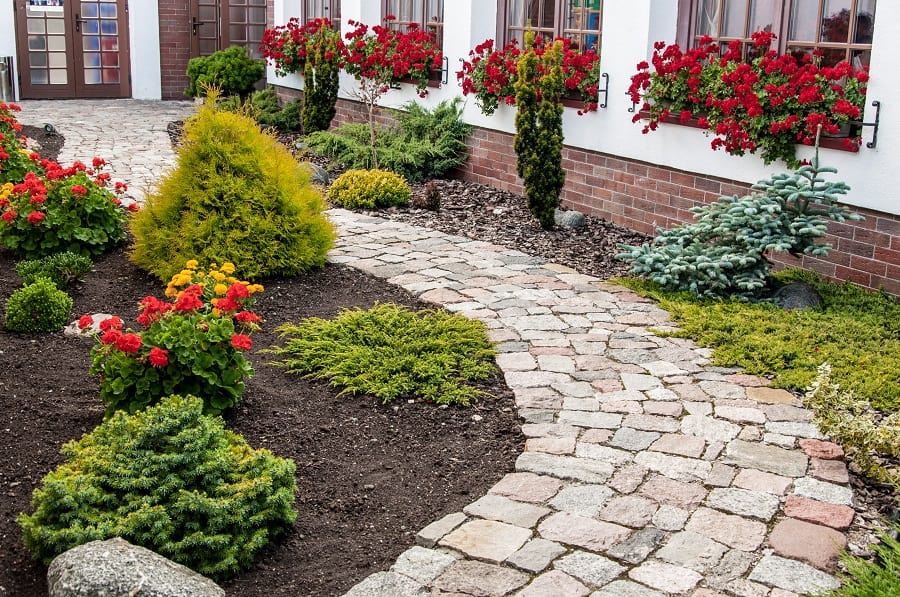 red stone brick pattern walkway garden