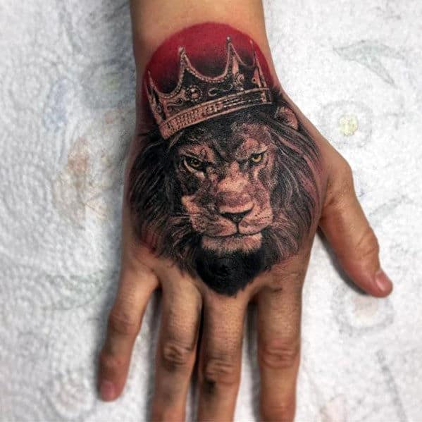 Red Sun With Lion Wearing Crown Guys Hand Tattoo
