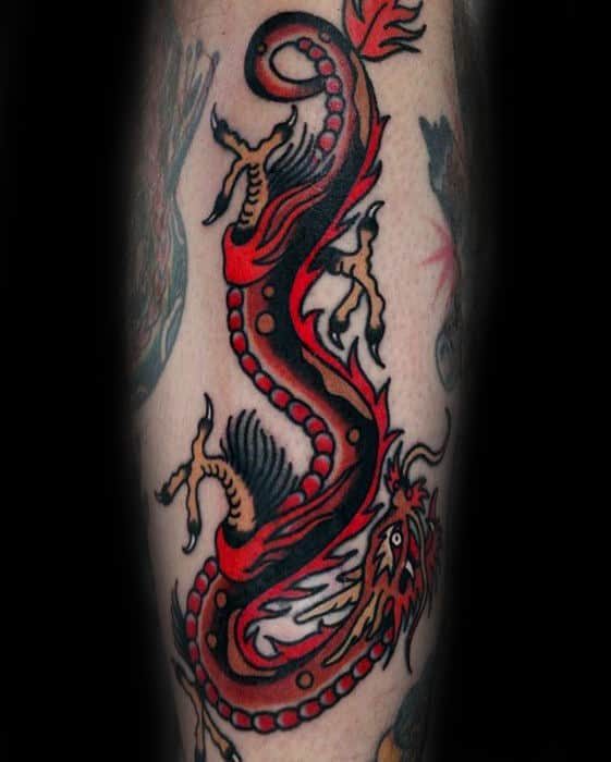 Red Traditional Dragon Male Tattoo On Forearm
