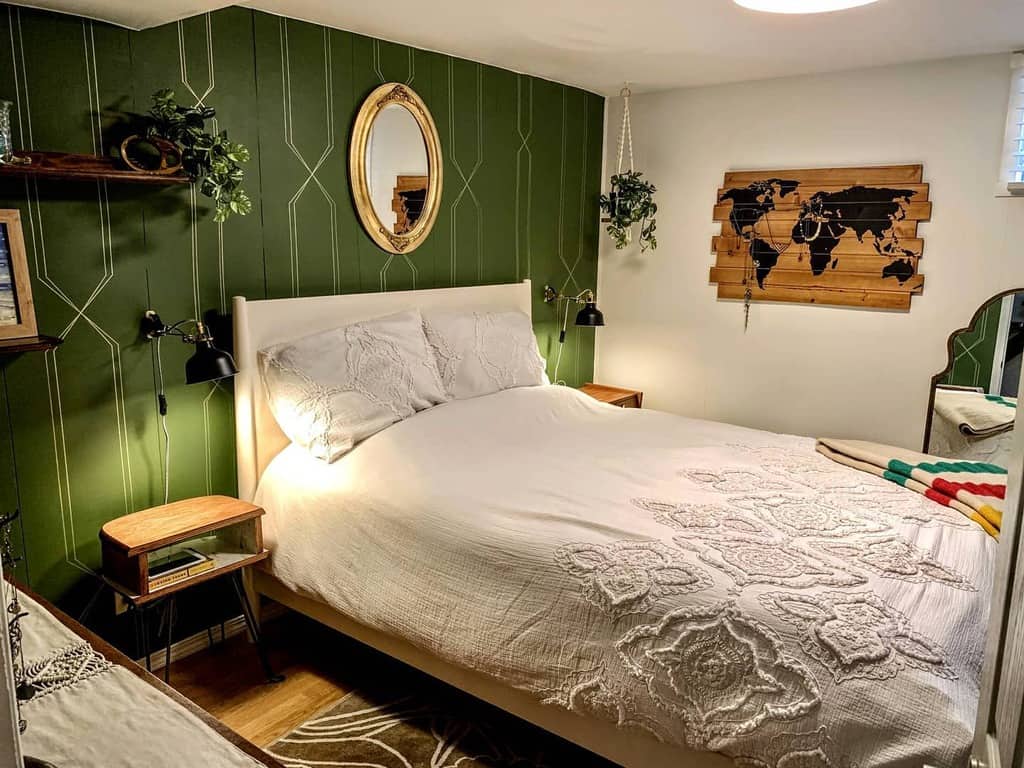 vintage remodel basement bedroom with green accent wall 