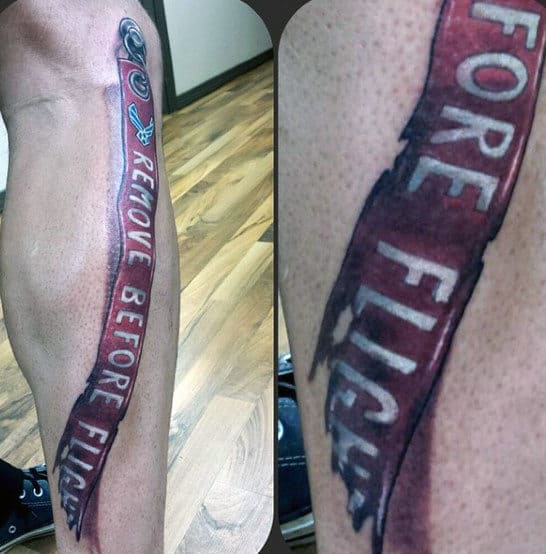 Remove Before Flight Air Force Tattoo On Mans Leg