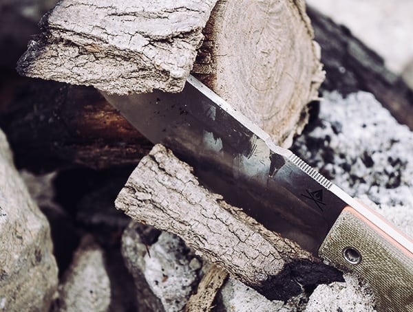 Removing Bark From Log With White River Knives Firecraft Survival Knife