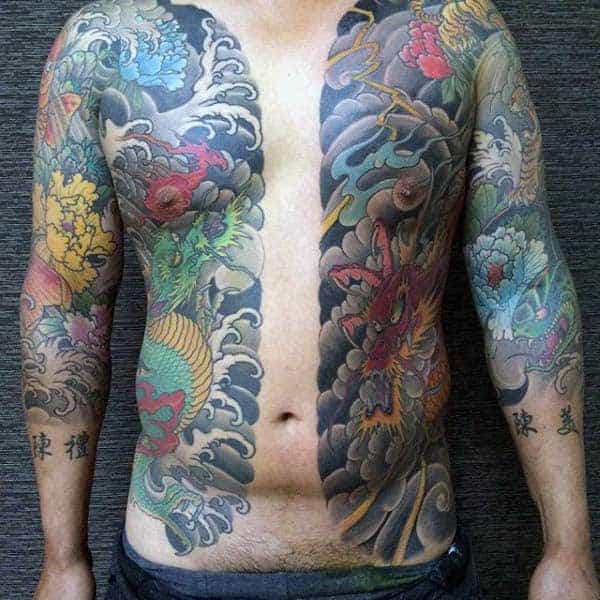 rib-cage-side-and-chest-japanese-dragon-male-tattoos