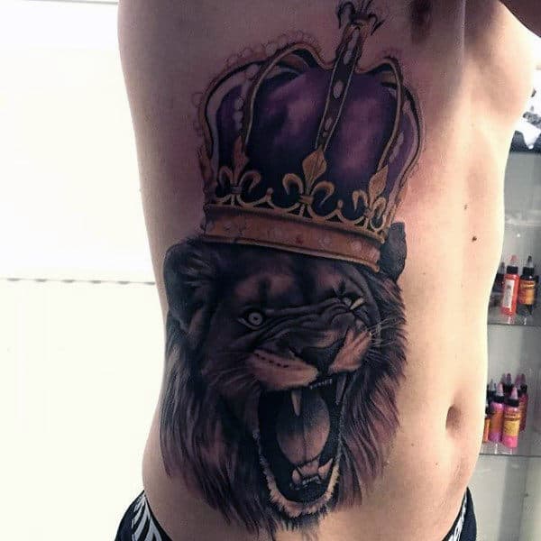 Rib Cage Side Lion With Crown King Animal Of The Jungle Tattoo For Guys