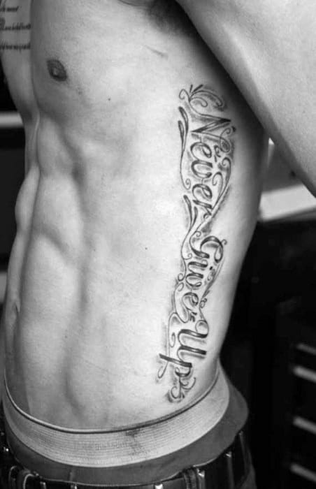 60 Never Give Up Tattoos For Men - Phrase Design Ideas