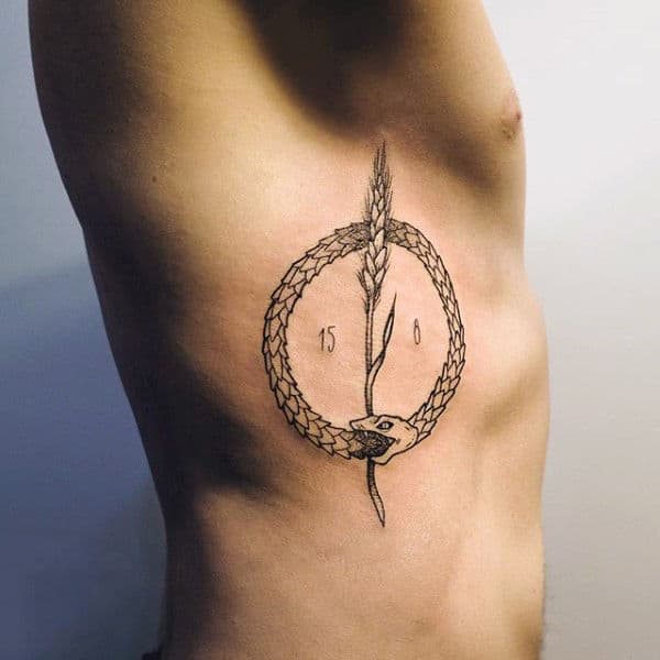 Rib Cage Side Wheat Stalk With Ouroboros Mens Tattoos
