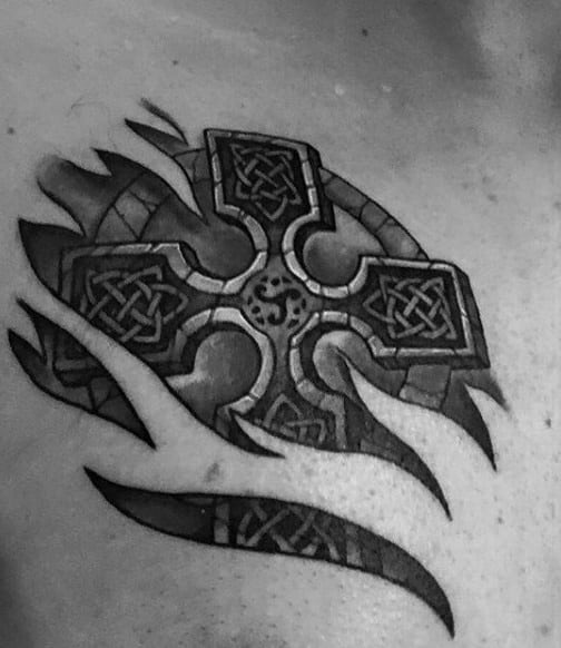 Ripped Skin Celtic Cross Upper Chest Tattoo On Male