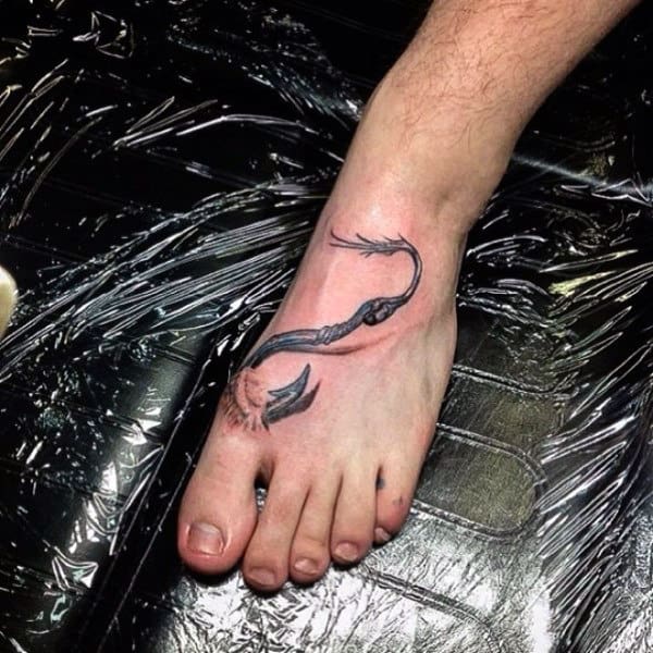 Ripped Skin Foot Fish Hook Tattoo For Guys
