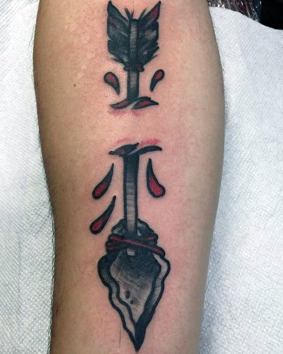 Ripped Skin Guys Arrow Traditional Inner Forearm Tattoo